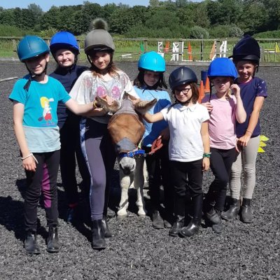 group of children with donkey